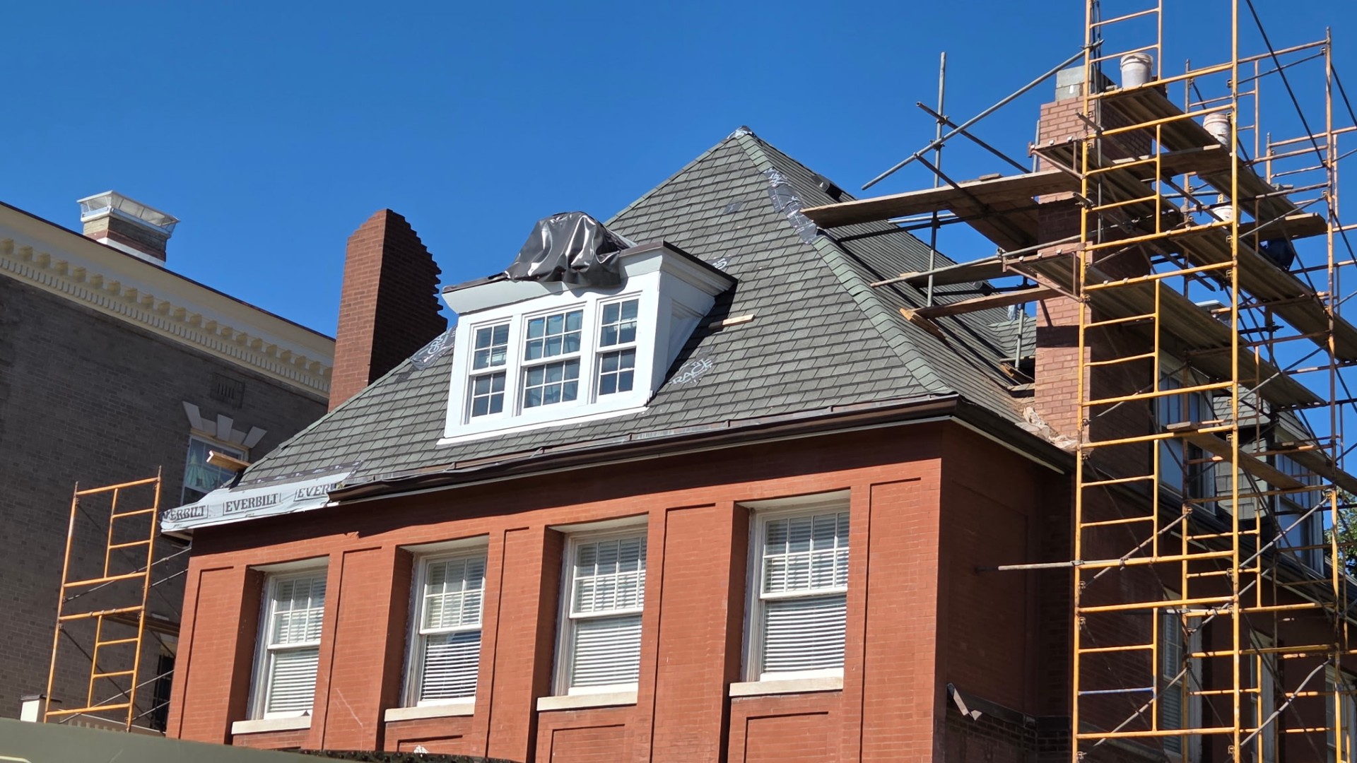 Brick masonry restoration on a commercial facade